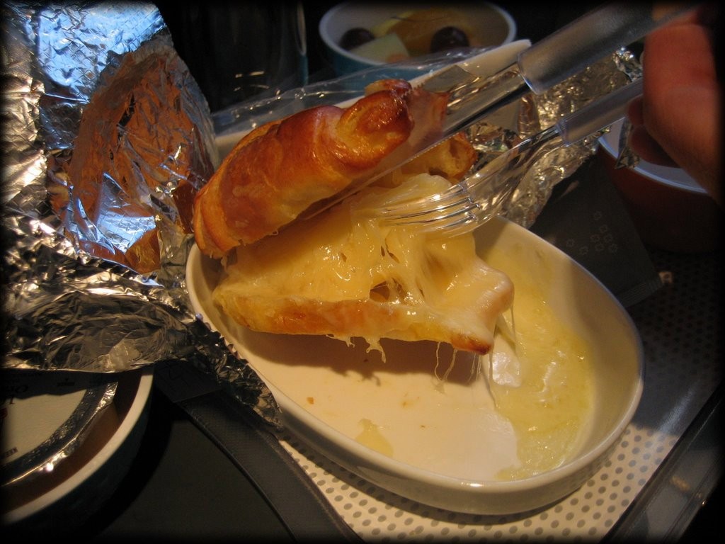 On our way from Tahiti to Rarotonga, Air New Zealand offered us this tasty heart-attack-in-a-sandwich.  Inside, it wasn't so cooked, so we counted 22 layers of cheese!