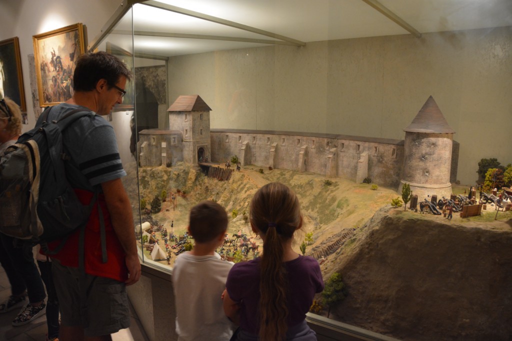 Checking out the diorama of the Castle of Eger. Our kids have always been fascinated with anything in miniature :)