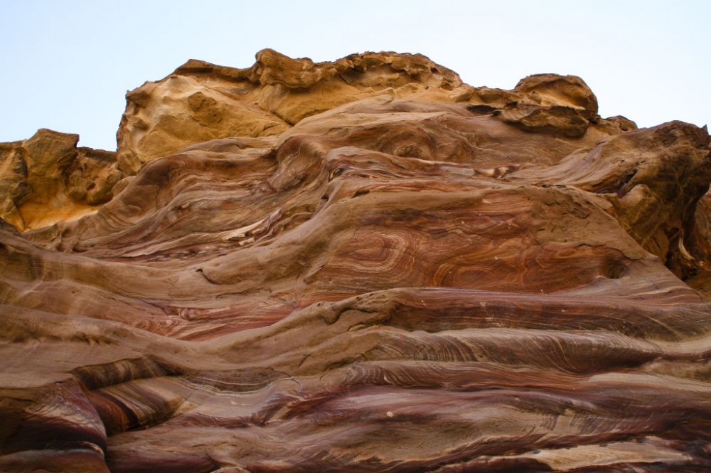 Beautiful layers of sandstone rock seen on the way up to the Treasury.