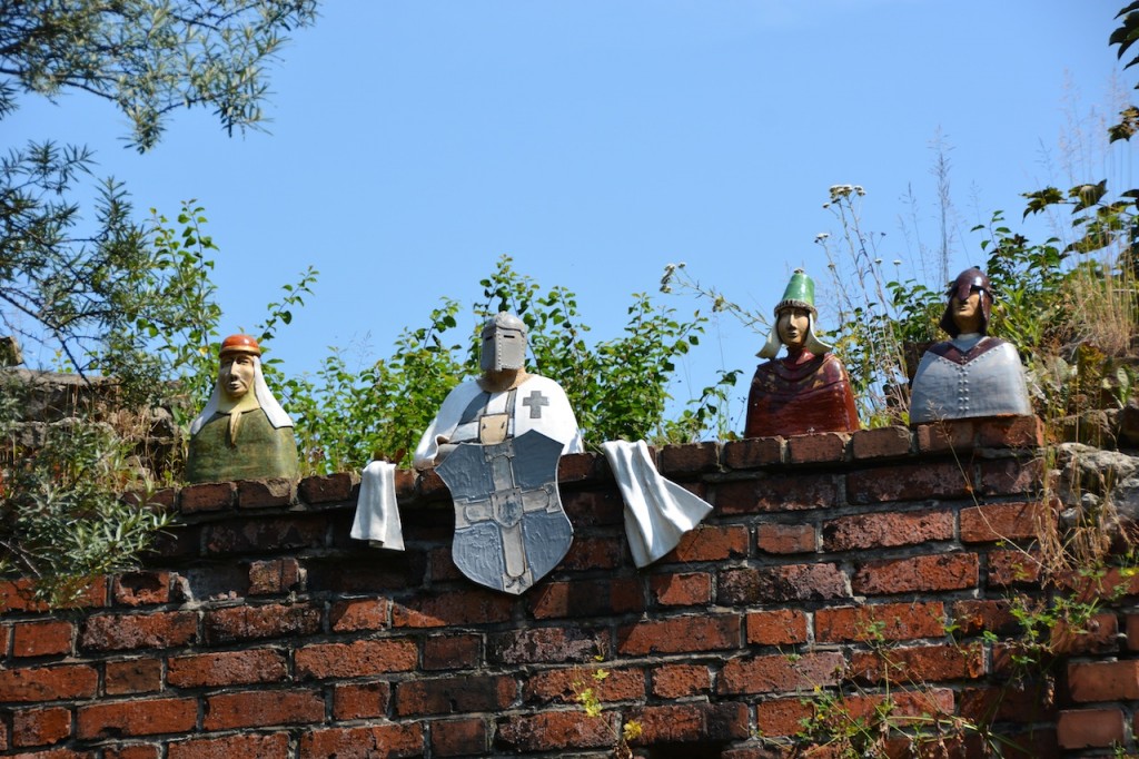 Outside Pienikowe Miasteczko (Gingerbread City) playground, teutonic knights are part of the display of Medieval Toruń townsmen around the town.