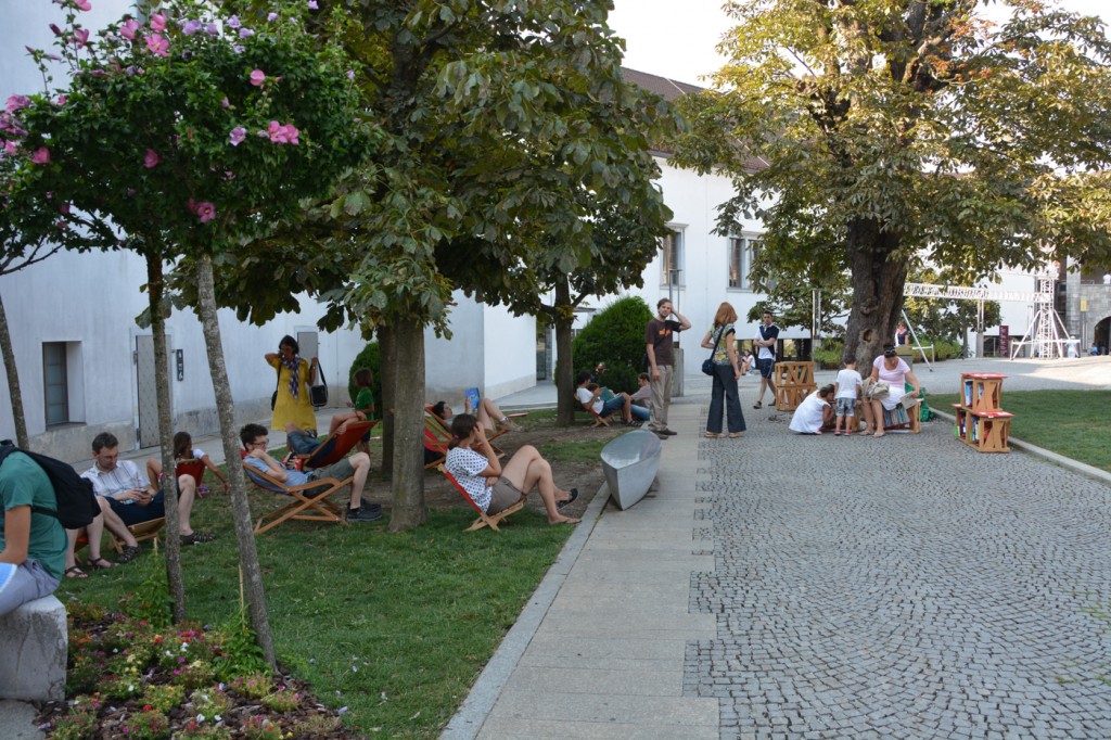 Hanging out in the courtyard of the castle, with a little public library and lounge chairs