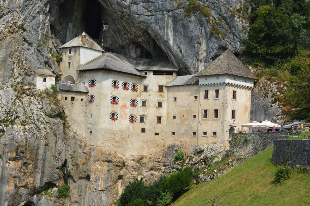 Predjama Castle is a little past the Postojna cave.  Built right on the cliff wall (with some tunnels that lead into the cliffs from the top!) It is a really fun castle to explore.