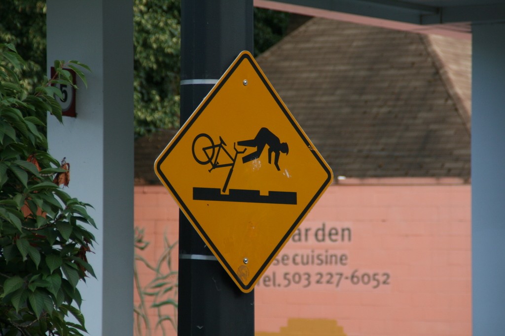 Funny road sign warning bicycles of bumps in the road