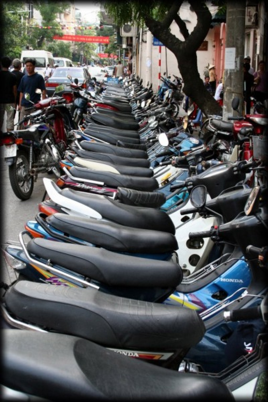 Our biggest complaint about Hanoi (and Saigon) was that the cities were completely overrun by motorcycles.  The roads are complete chaos, and crossing them was a major event.