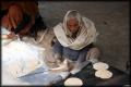 Making chappatis for the langur.