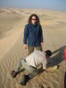 Sandboarding with Arabian Adventures on overnight safari