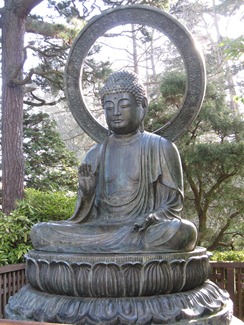 Buddha contemplates the zen tranquility of the Japanese Tea Garden, Golden Gate Park, San Francisco