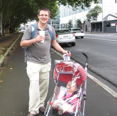 Windy day with off and on drizzle - perfect for the UppaBaby G-Lite rain cover.  Velcro's to the stroller in seconds.  Flap's up for a bit of air.