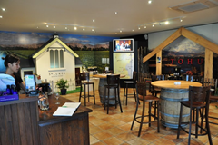 Inside The Wine Room, Marlborough, New Zealand.  Many different wineries have wine available to be tasted.