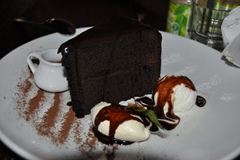 About to enjoy "Aztec Treasure" - a heavenly slice of super-rich chocolate cake at The Flying Burrito Brothers restaurant in Christchurch, New Zealand.  Notice how we forgot to photograph our dinners, but this masterpiece we definitely remembered to record! ;)