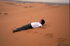 Making "snow angels" in the Sahara.