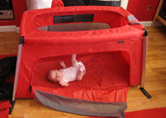 Checking out the Phil & Ted's Travel Cot for the first time.  It's gotten a LOT of use since then!