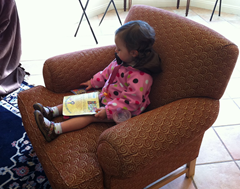 Relaxing at a winery with some of her Indestructibles books.  Washable and super durable, these make a great toddler travel toy, at home or on the road.